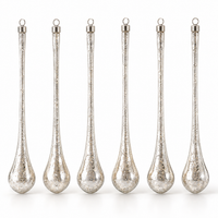 Mercury glass teardrop ornament close-up, antiqued silver finish