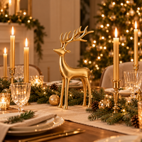 Gold reindeer Christmas decor on a holiday mantel